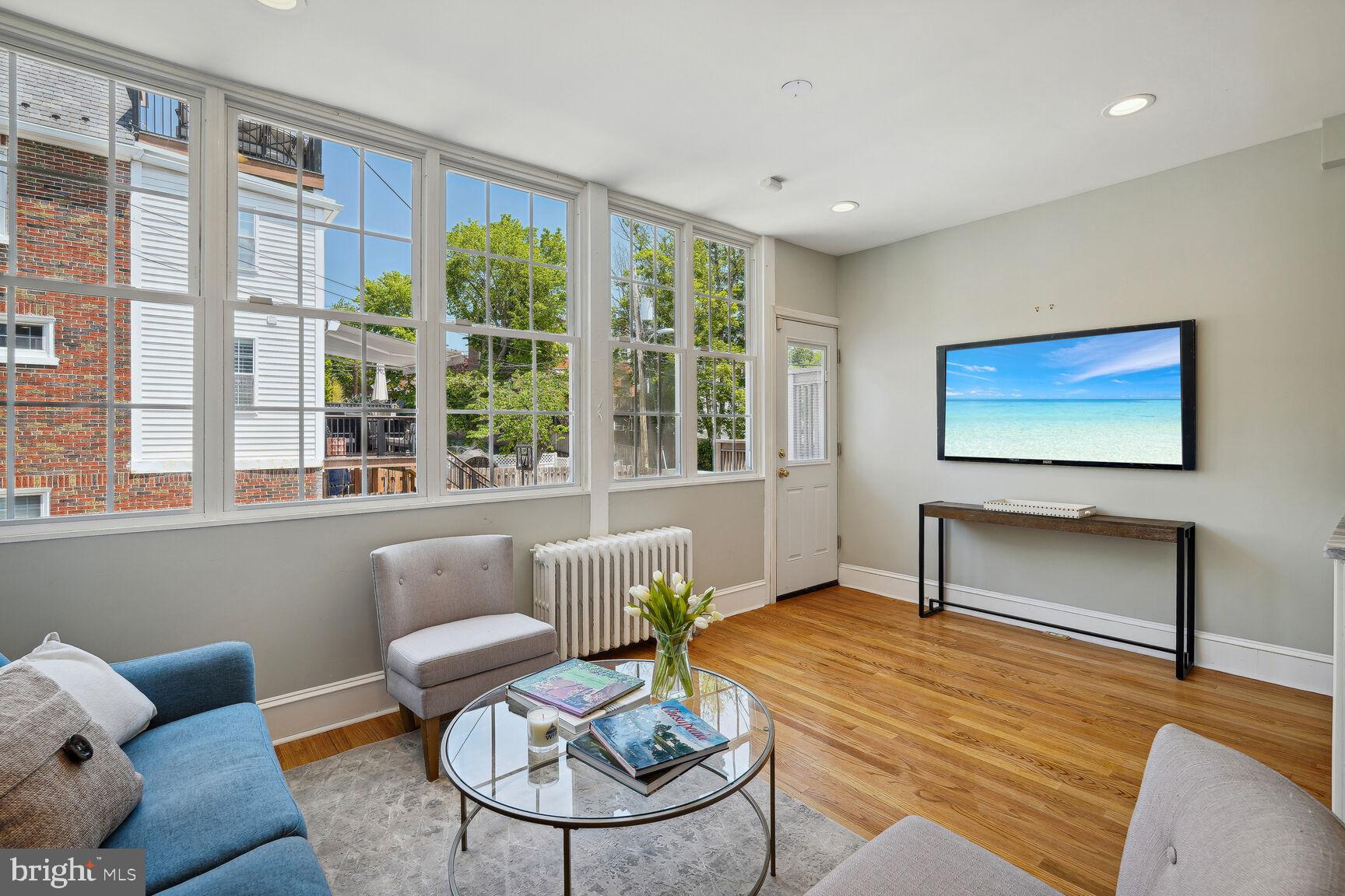 3863 Beecher Street Northwest Washington, DC 20007 - Photo 7 of 19 a living room with furniture and a large window