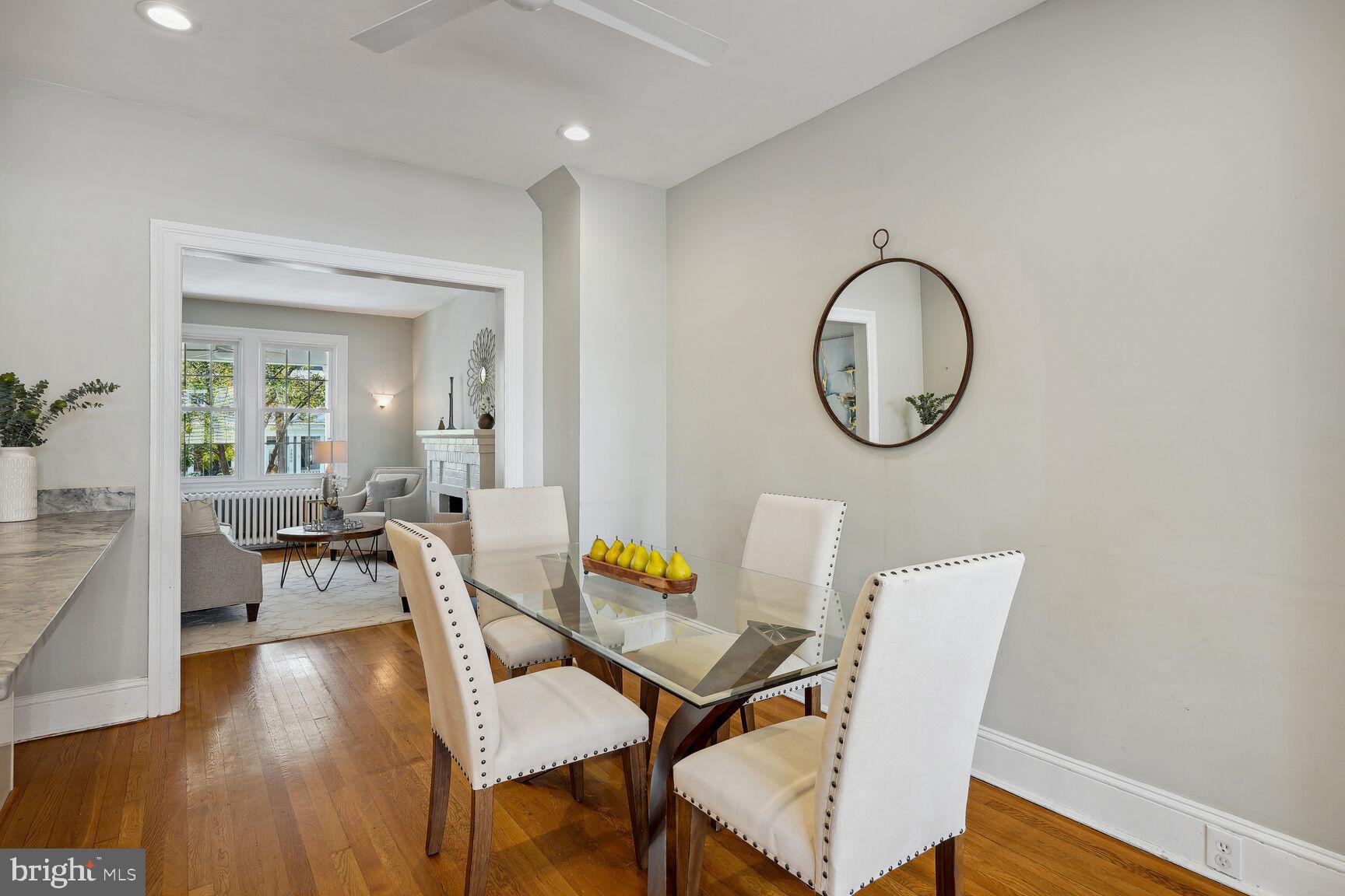 3863 Beecher Street Northwest Washington, DC 20007 - Photo 8 of 19 a view of a dining room with furniture and wooden floor