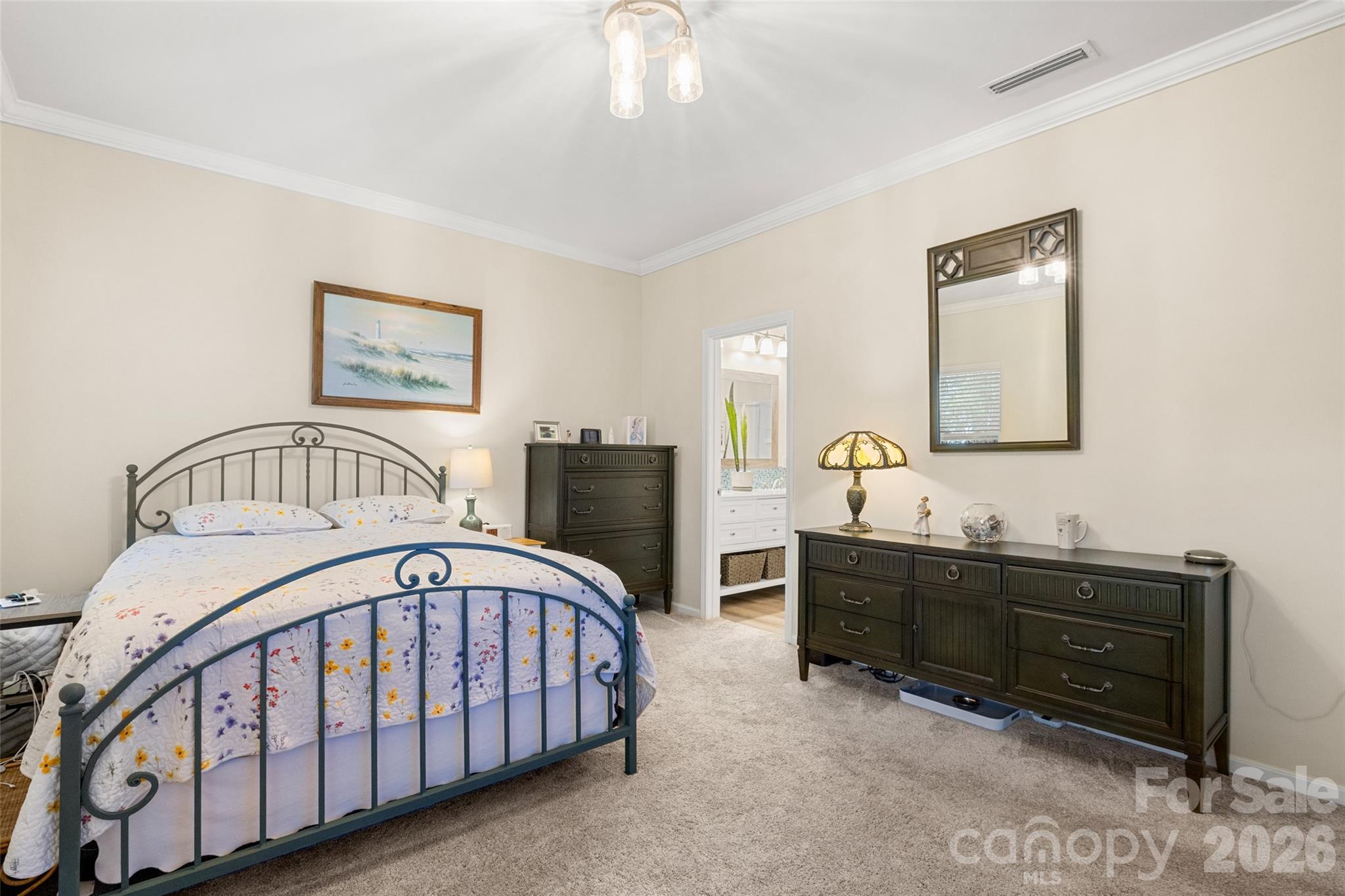 25320 Seagull Drive Lancaster, SC 29720 - Photo 15 of 37 a bedroom with a bed and a dresser