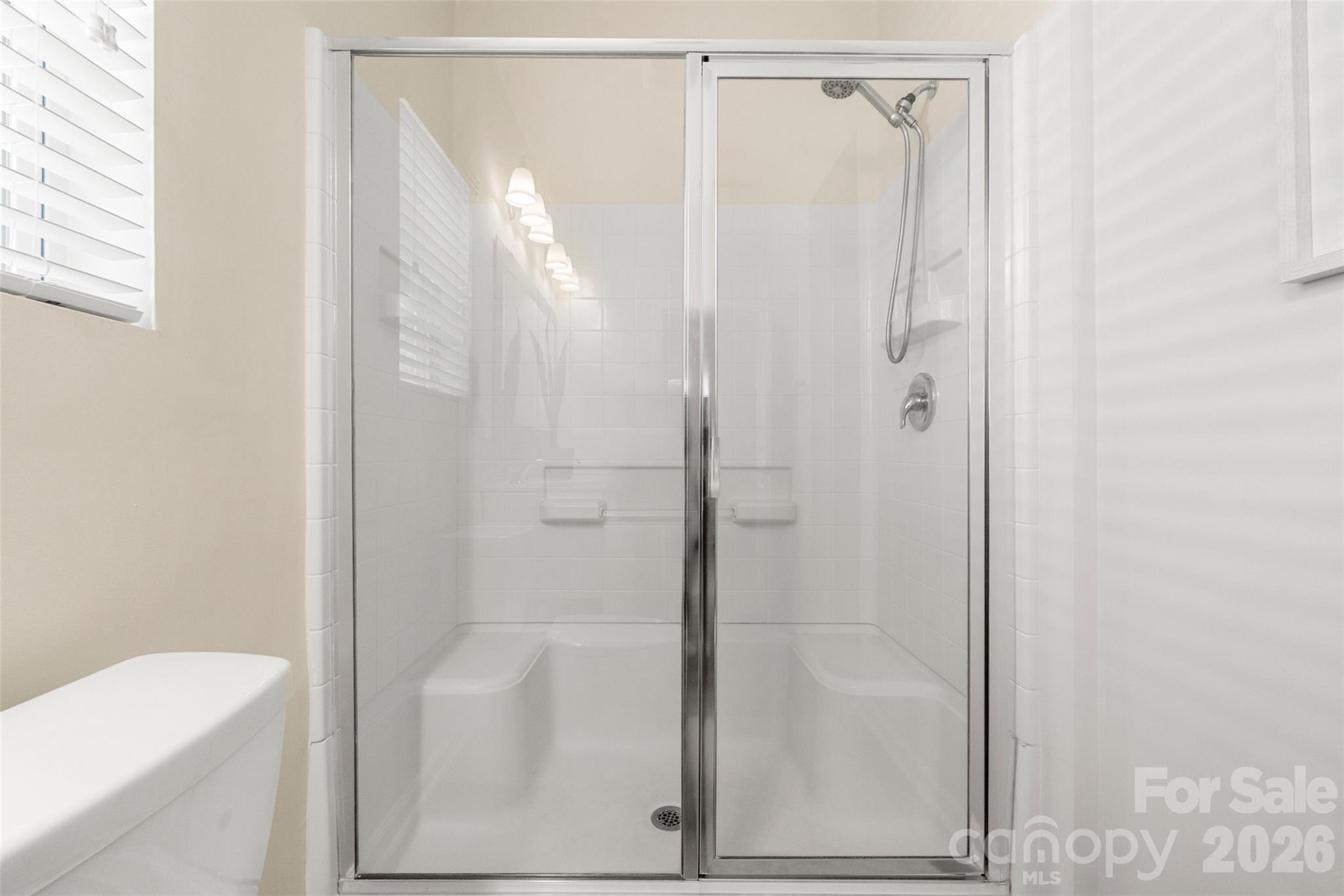 25320 Seagull Drive Lancaster, SC 29720 - Photo 17 of 37 a bathroom with a shower and a sink
