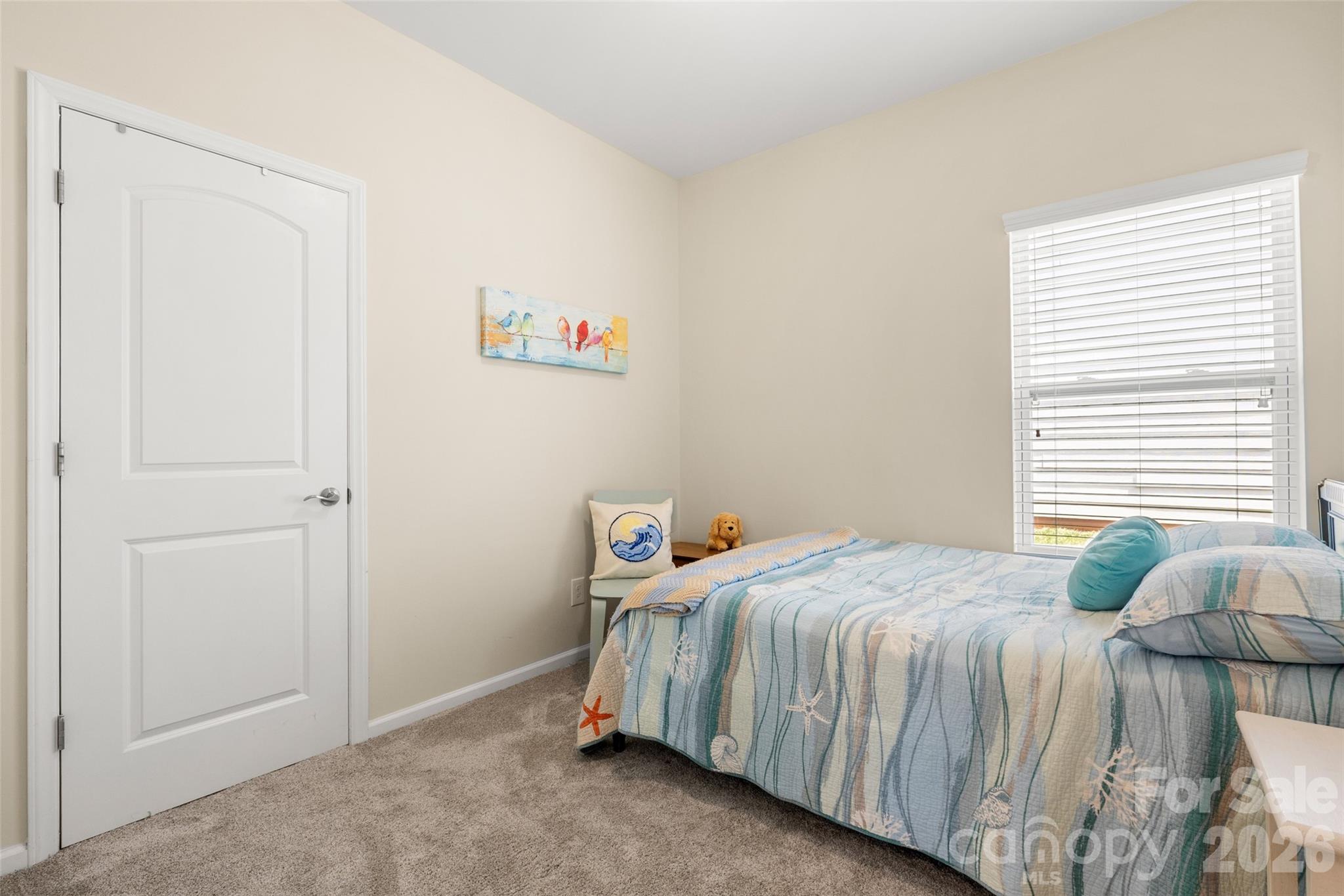 25320 Seagull Drive Lancaster, SC 29720 - Photo 19 of 37 a bedroom with a bed and window