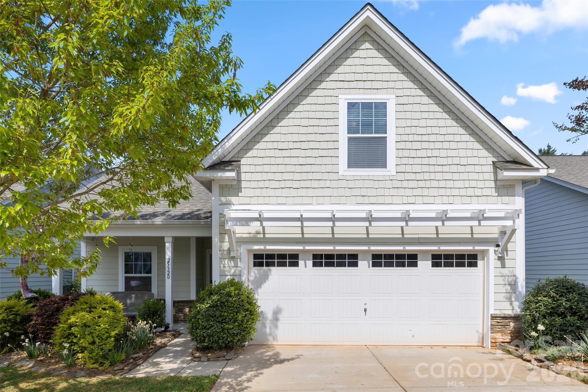 25320 Seagull Drive Lancaster, SC 29720 - Photo 2 of 37 a view of a house with a yard and potted plants