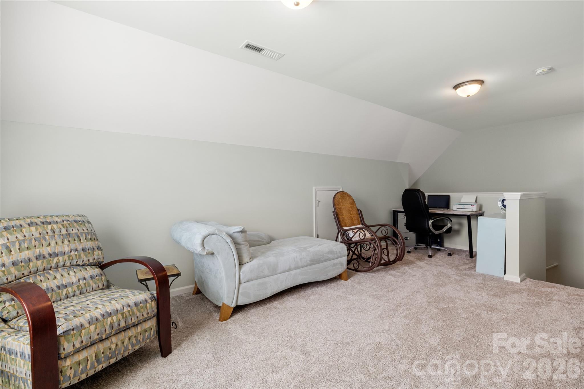 25320 Seagull Drive Lancaster, SC 29720 - Photo 23 of 37 a living room with furniture and a large window