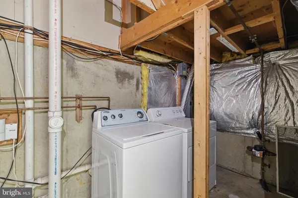 a utility room with a washer and dryer