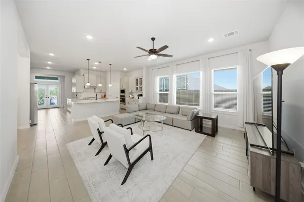 a living room with furniture and a table