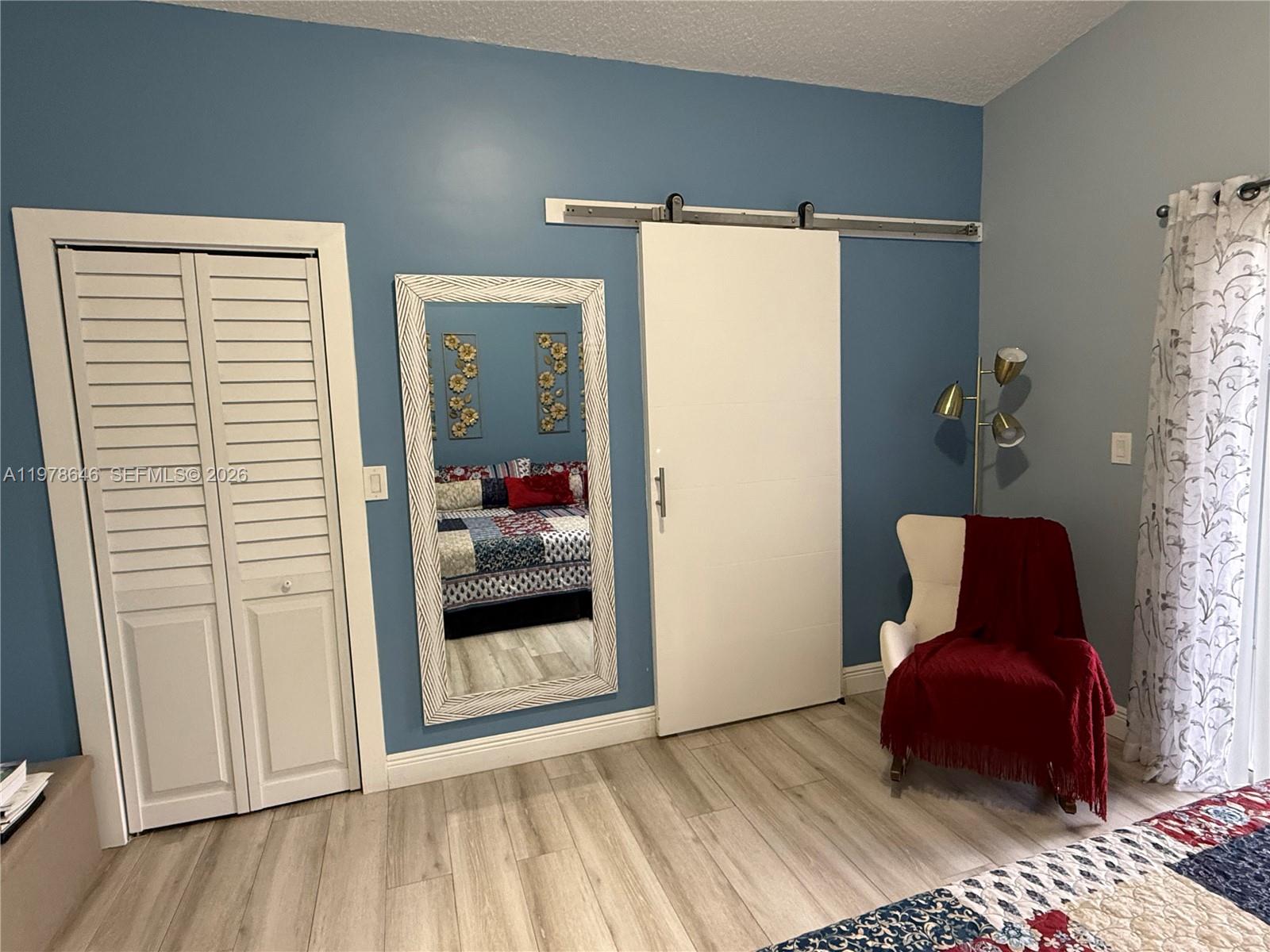 13833 Southwest 157th Street Miami, FL 33177 - Photo 12 of 25 a bedroom with a bed and a window