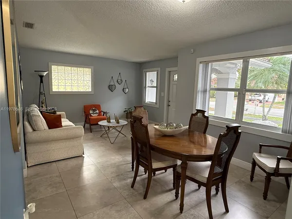 a view of a livingroom and dining room
