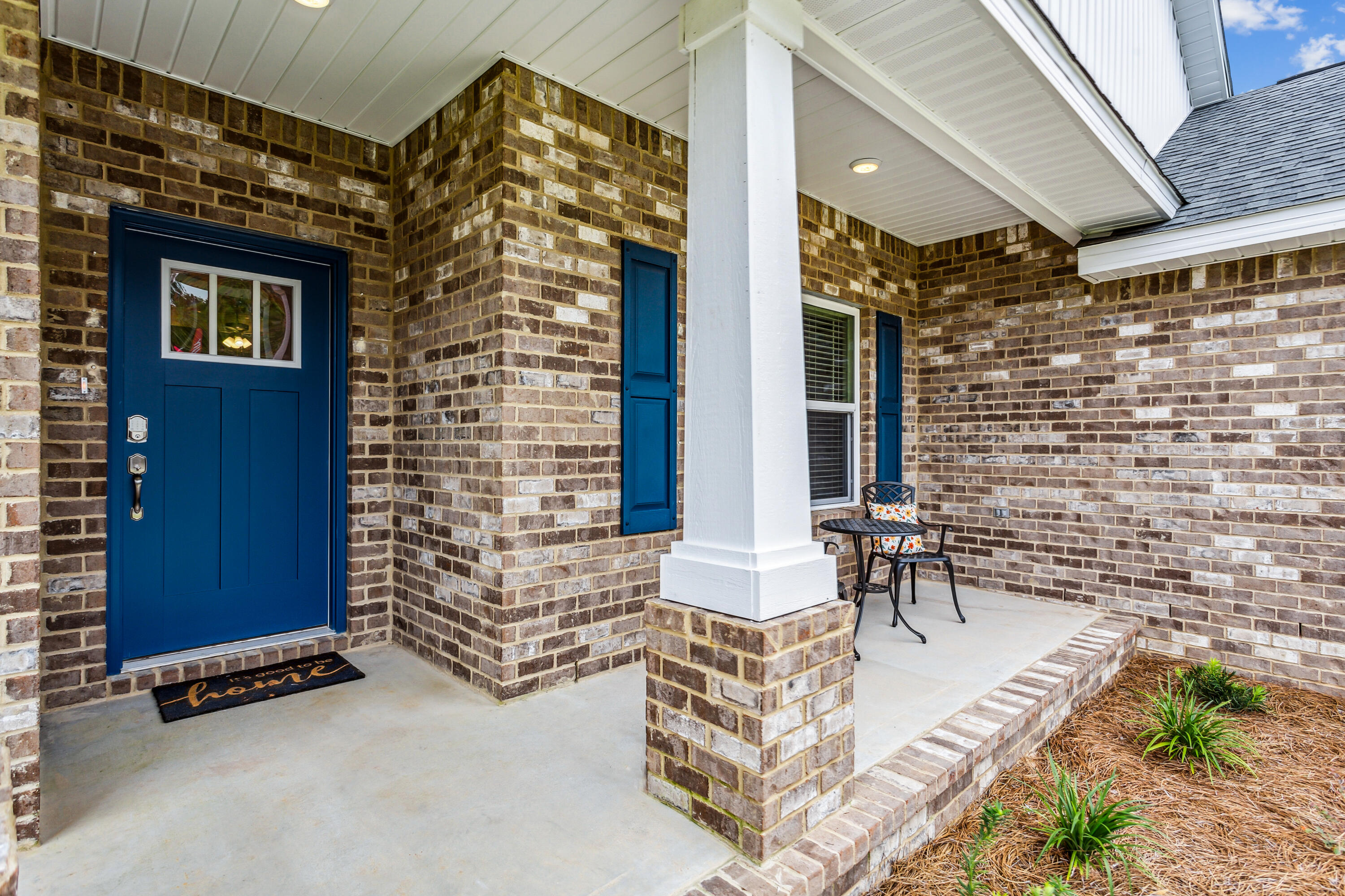 4293 Carl Booker Road Milton, FL 32583 - Photo 5 of 46 a building outdoor space with patio furniture