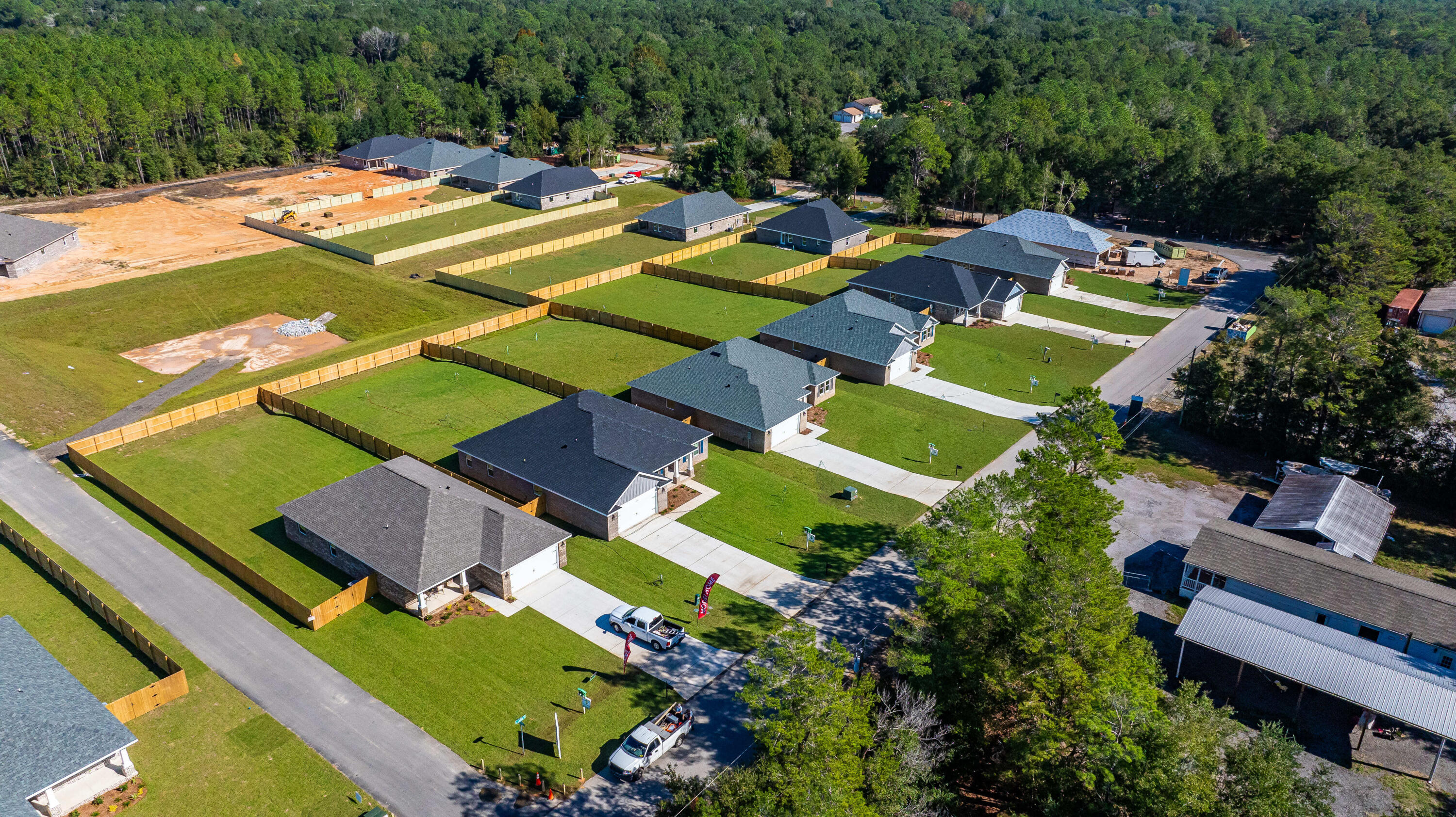 4293 Carl Booker Road Milton, FL 32583 - Photo 8 of 46 an aerial view of a pool patio swimming pool and outdoor seating