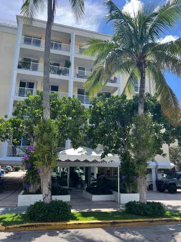 a view of house with yard