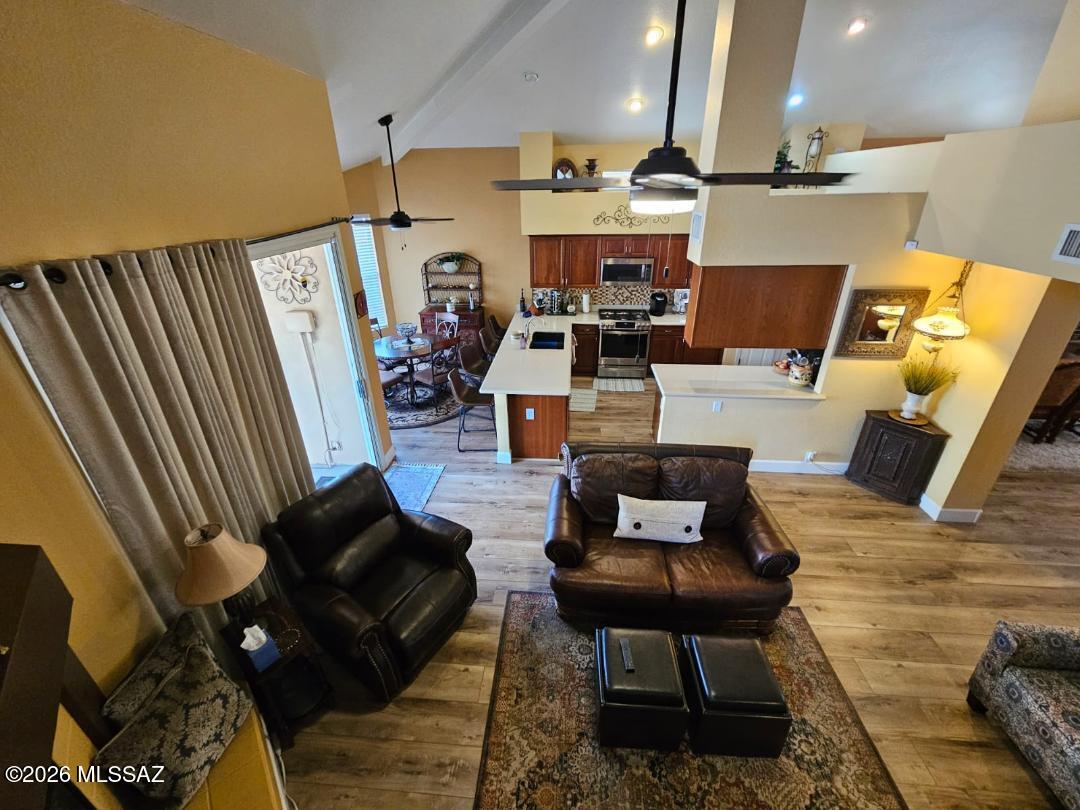 3130 West Star Ranch Trail Tucson, AZ 85742 - Photo 15 of 44 a living room with furniture and a flat screen tv