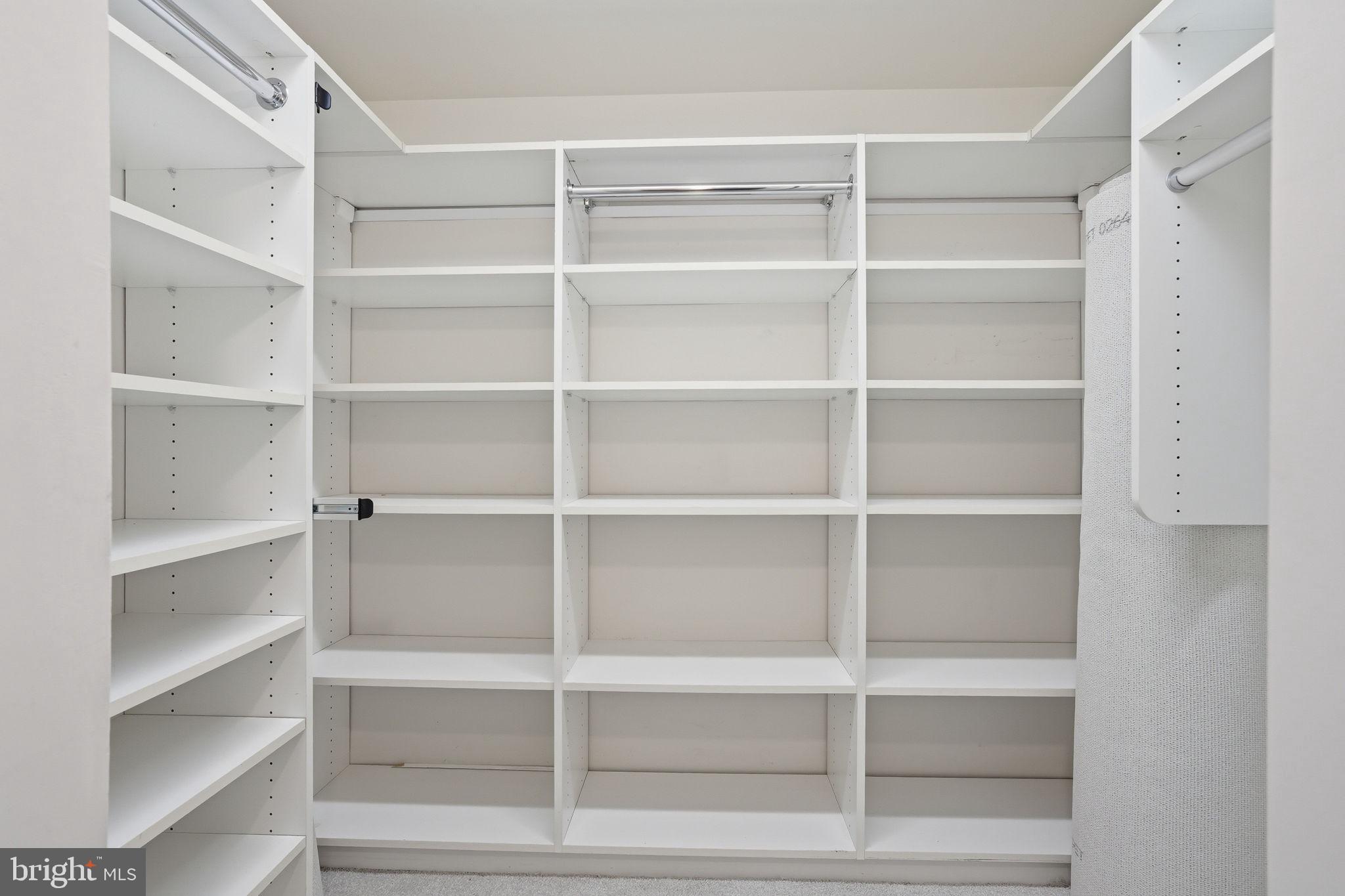 7 Slade Avenue, Unit 717 Baltimore, MD 21208 - Photo 12 of 31 First walk in closet in - Primary bedroom.