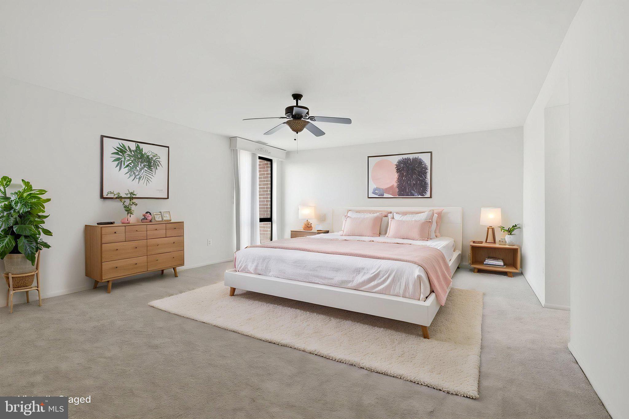 7 Slade Avenue, Unit 717 Baltimore, MD 21208 - Photo 9 of 31 Primary bedroom. Virtually staged by HD bros.