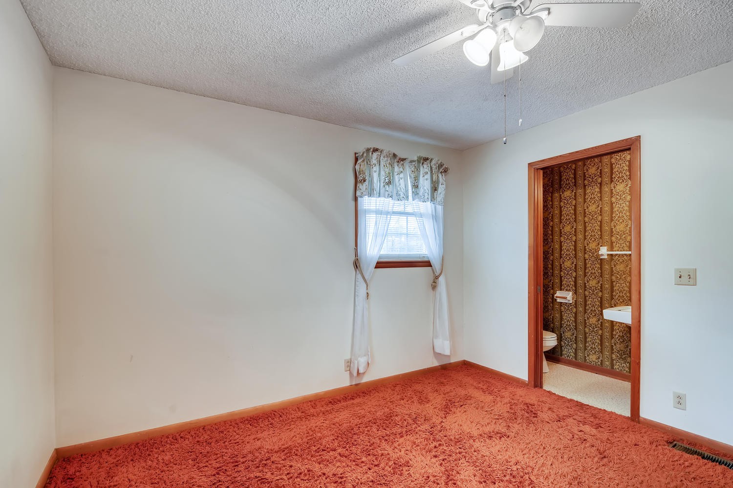 456 Rural Hill Road Nashville, TN 37217 - Photo 12 of 28 a view of a hallway with a chandelier fan and windows