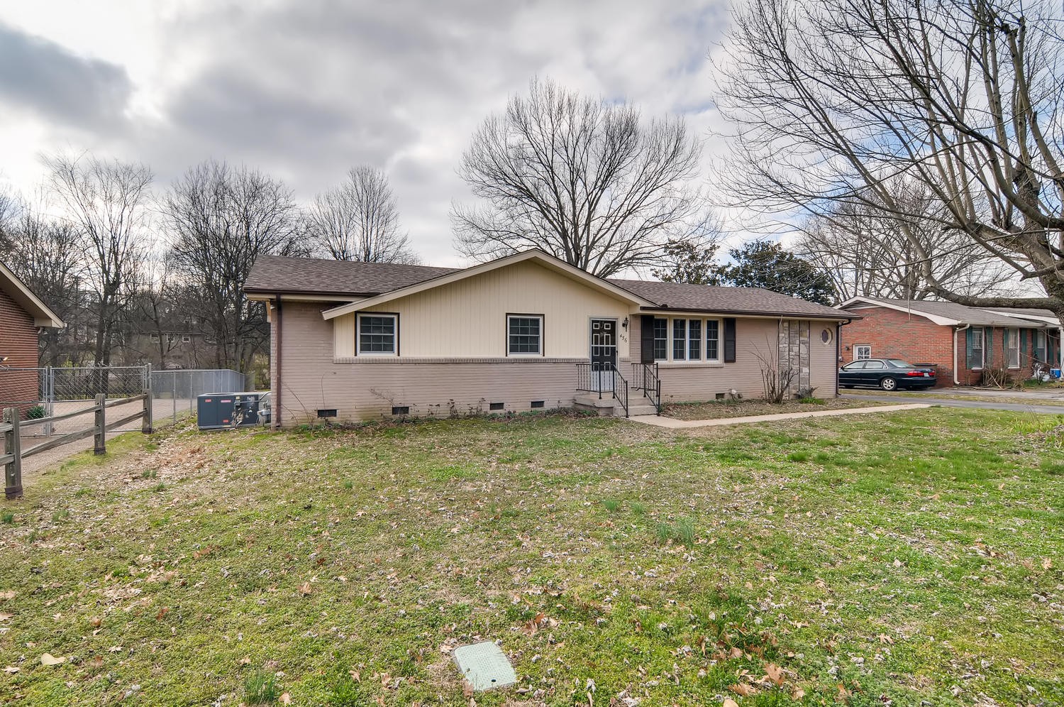 456 Rural Hill Road Nashville, TN 37217 - Photo 2 of 28 a backyard of a house with table and chairs