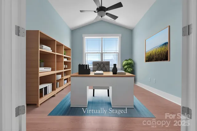 a view of a chair and tables in the patio