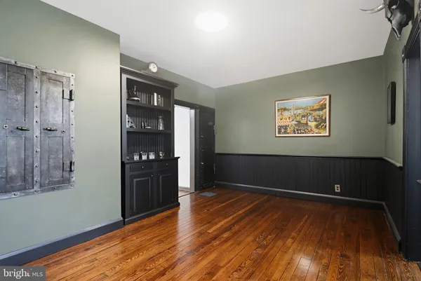 a bathroom with a shower and a toilet