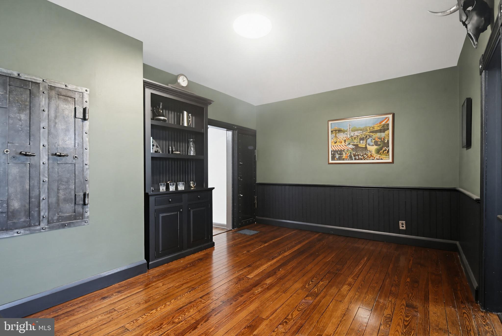 8556 Frederick Road Ellicott City, MD 21043 - Photo 11 of 38 a view of an empty room with closet and a window