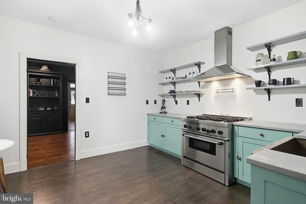 a bedroom with a bed and a potted plant