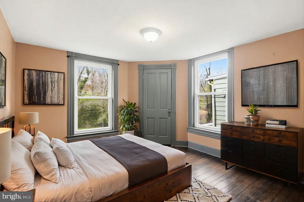 8556 Frederick Road Ellicott City, MD 21043 - Photo 21 of 38 a bedroom with a bed and a window