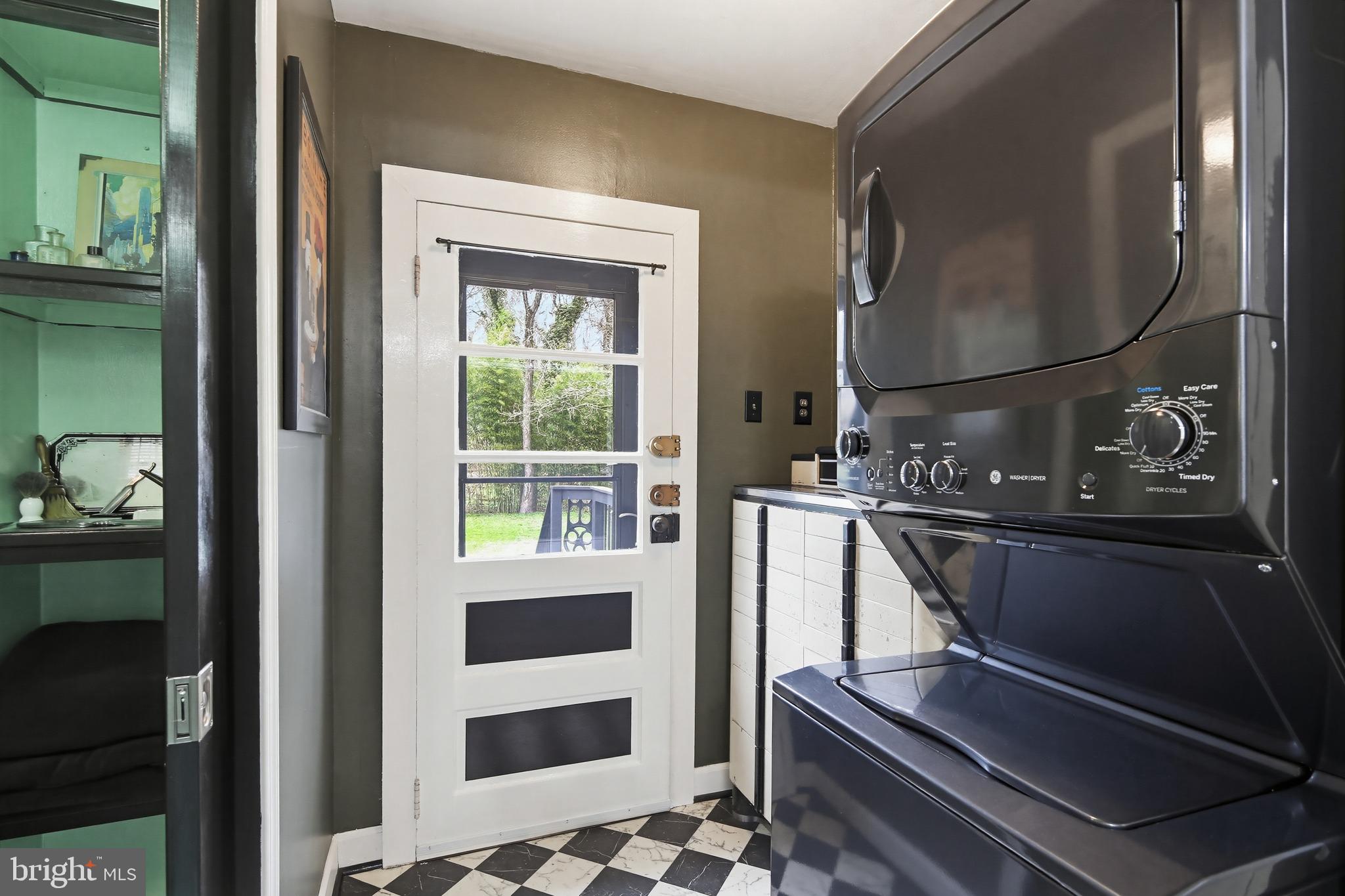 8556 Frederick Road Ellicott City, MD 21043 - Photo 27 of 38 a bathroom with a sink and a mirror