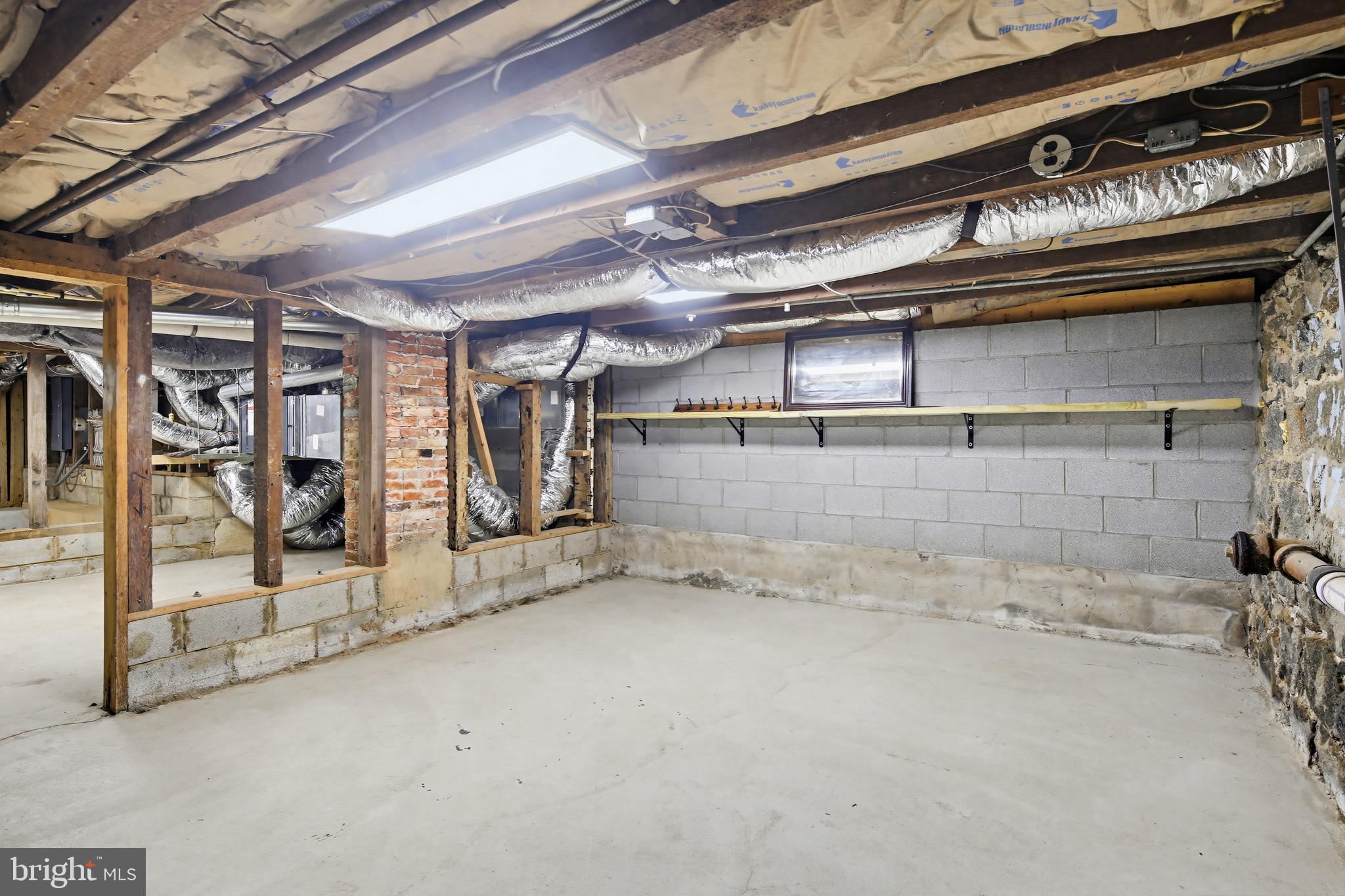8556 Frederick Road Ellicott City, MD 21043 - Photo 29 of 38 a view of a room with racks on the wall