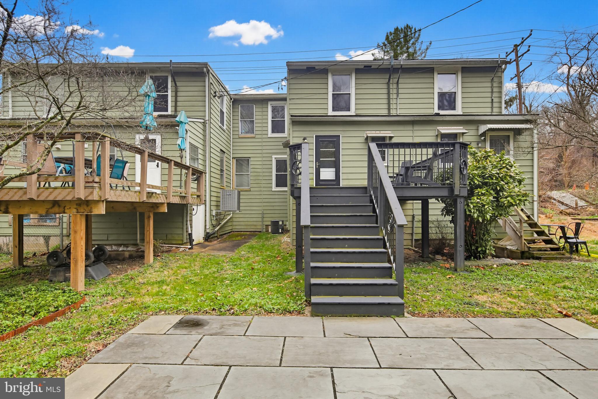 8556 Frederick Road Ellicott City, MD 21043 - Photo 35 of 38 a view of a house with a yard