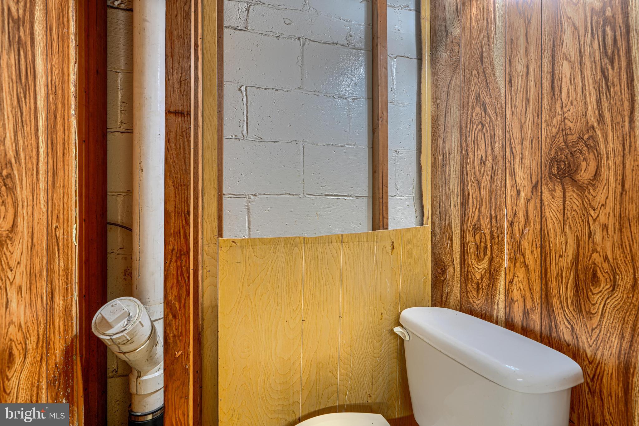 308 Imla Street Baltimore, MD 21224 - Photo 18 of 22 Toilet in a closet in the basement