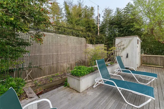 a patio with table and chairs