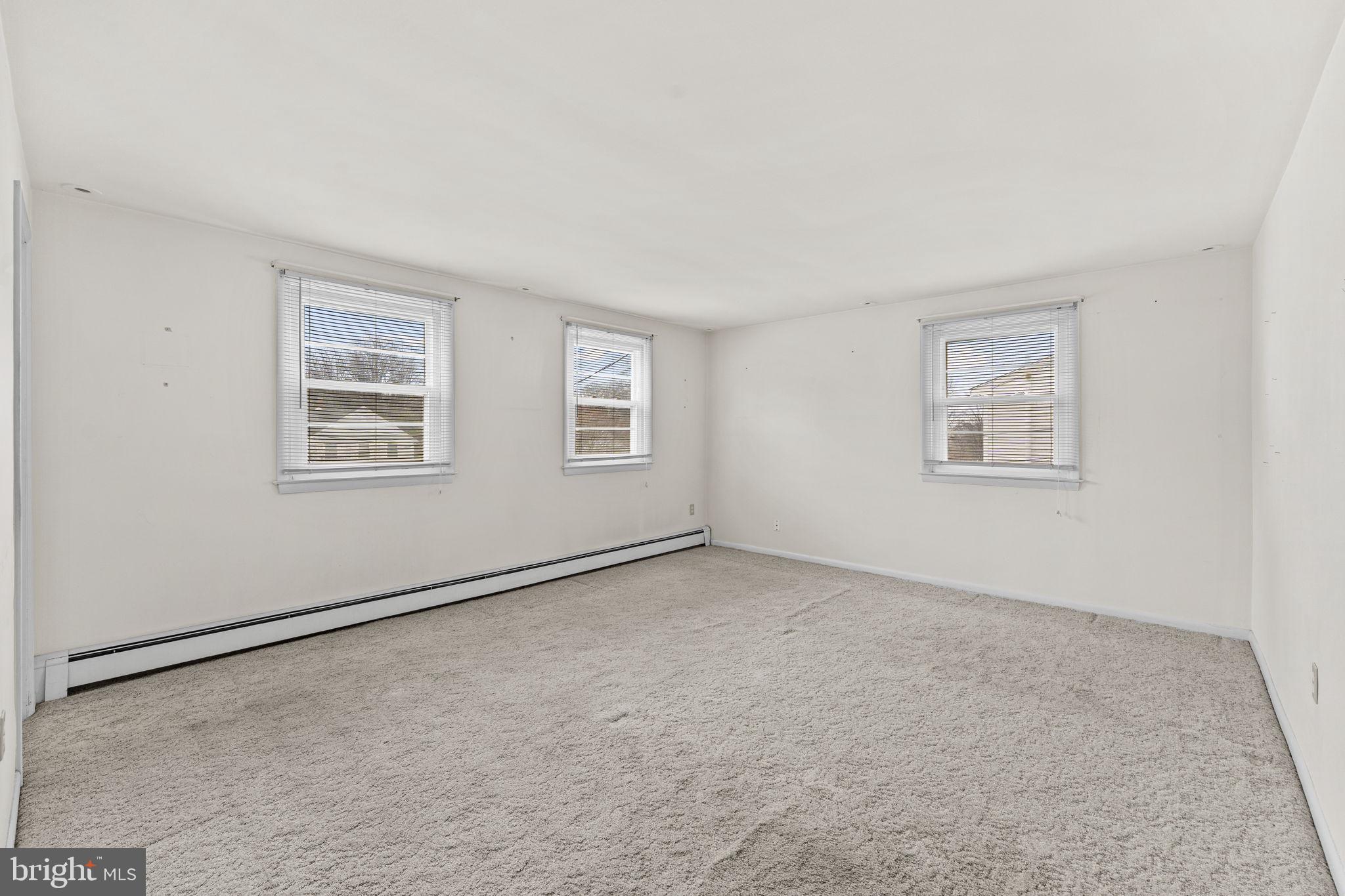 1022 Crozer Lane Springfield, PA 19064 - Photo 15 of 42 a view of an empty room with a window