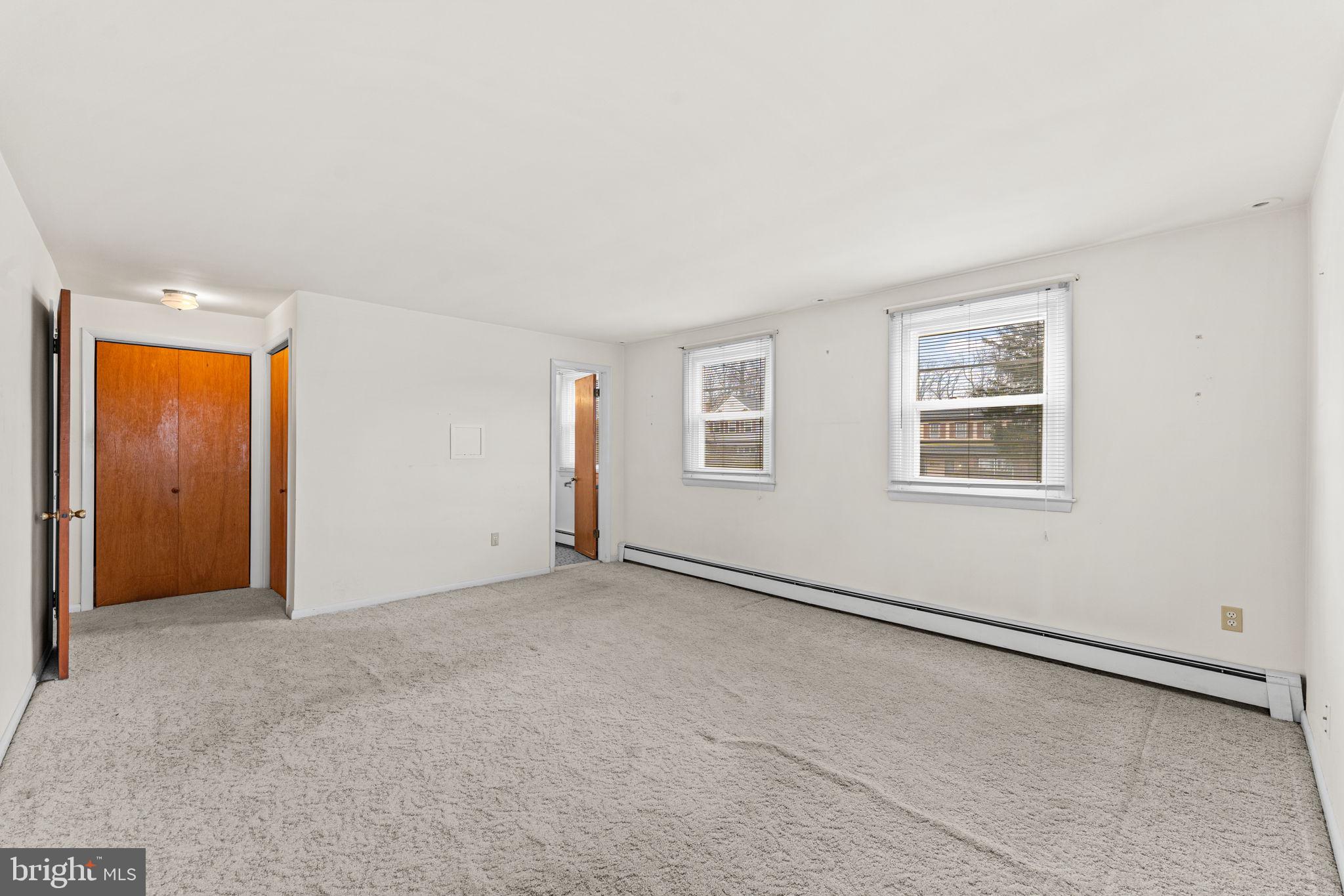 1022 Crozer Lane Springfield, PA 19064 - Photo 16 of 42 an empty room with windows and closet
