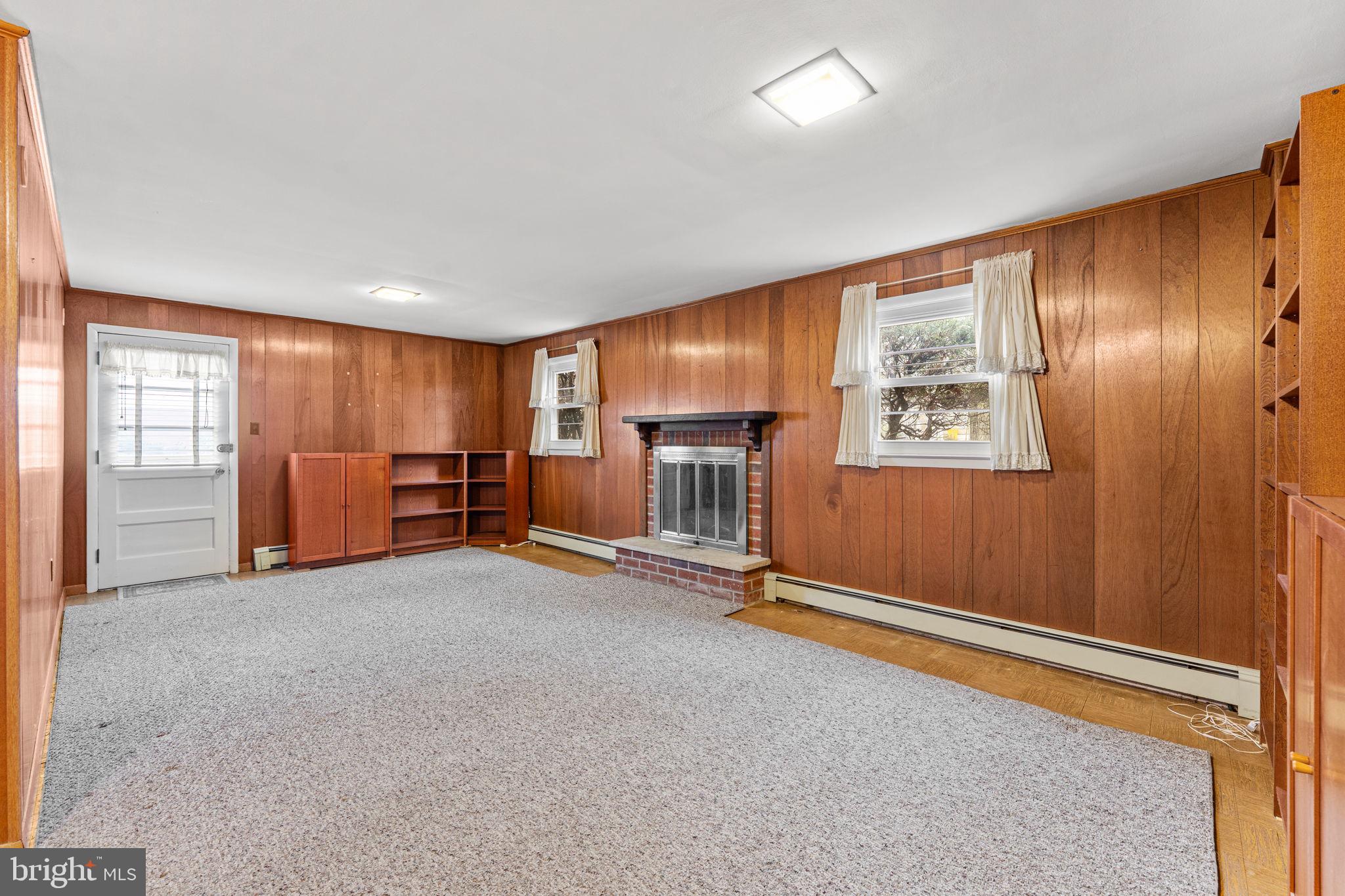 1022 Crozer Lane Springfield, PA 19064 - Photo 26 of 42 an empty room with furniture and windows