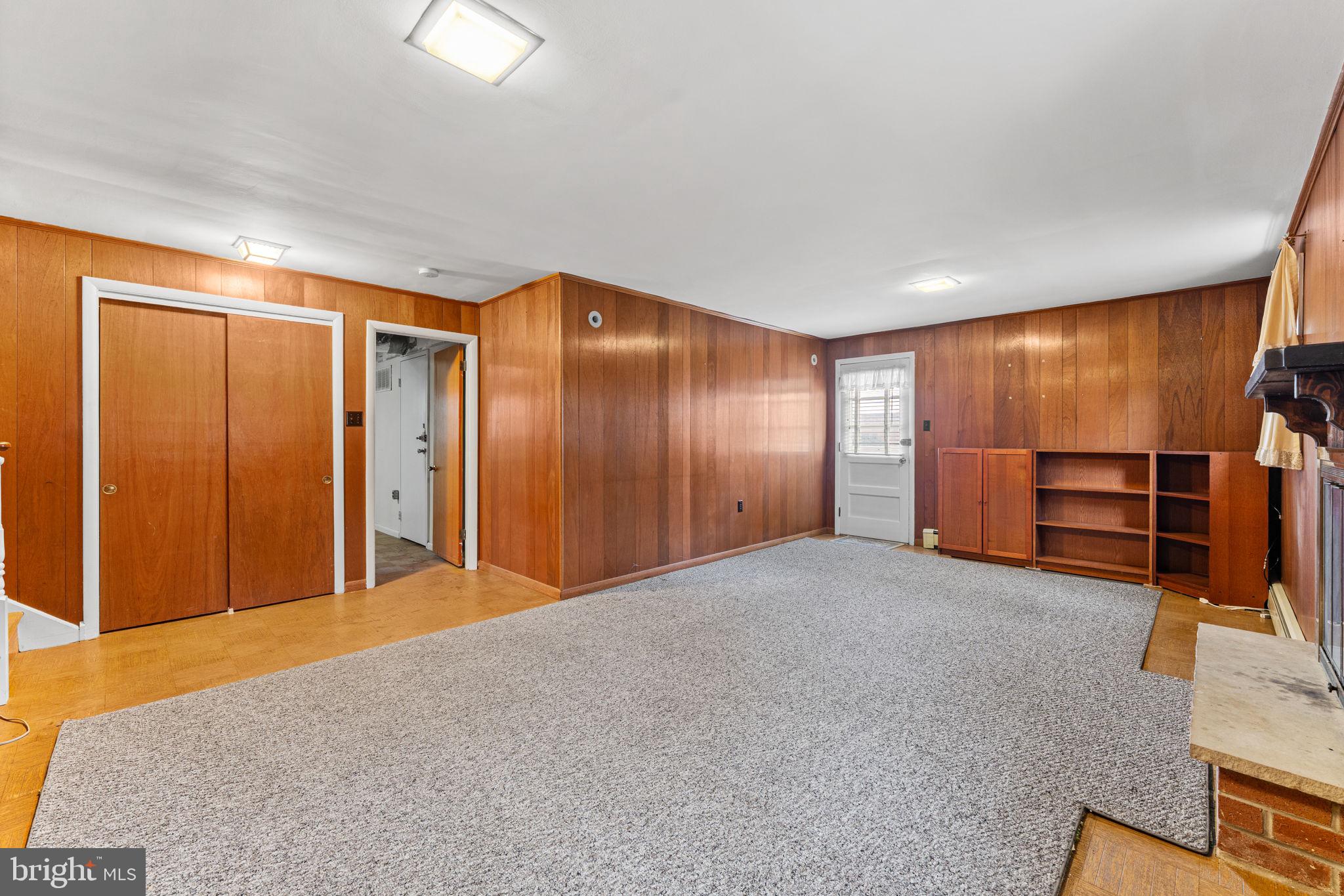 1022 Crozer Lane Springfield, PA 19064 - Photo 27 of 42 a view of an empty room with wooden floor