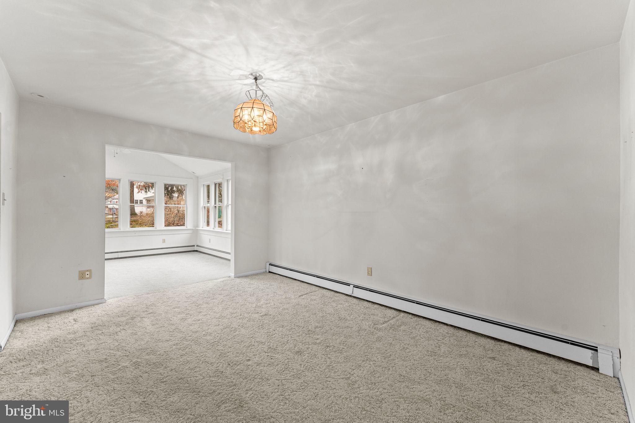 1022 Crozer Lane Springfield, PA 19064 - Photo 7 of 42 an empty room with windows