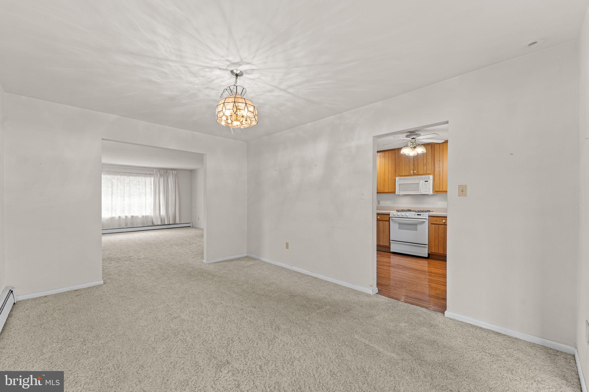 1022 Crozer Lane Springfield, PA 19064 - Photo 8 of 42 en empty room with windows