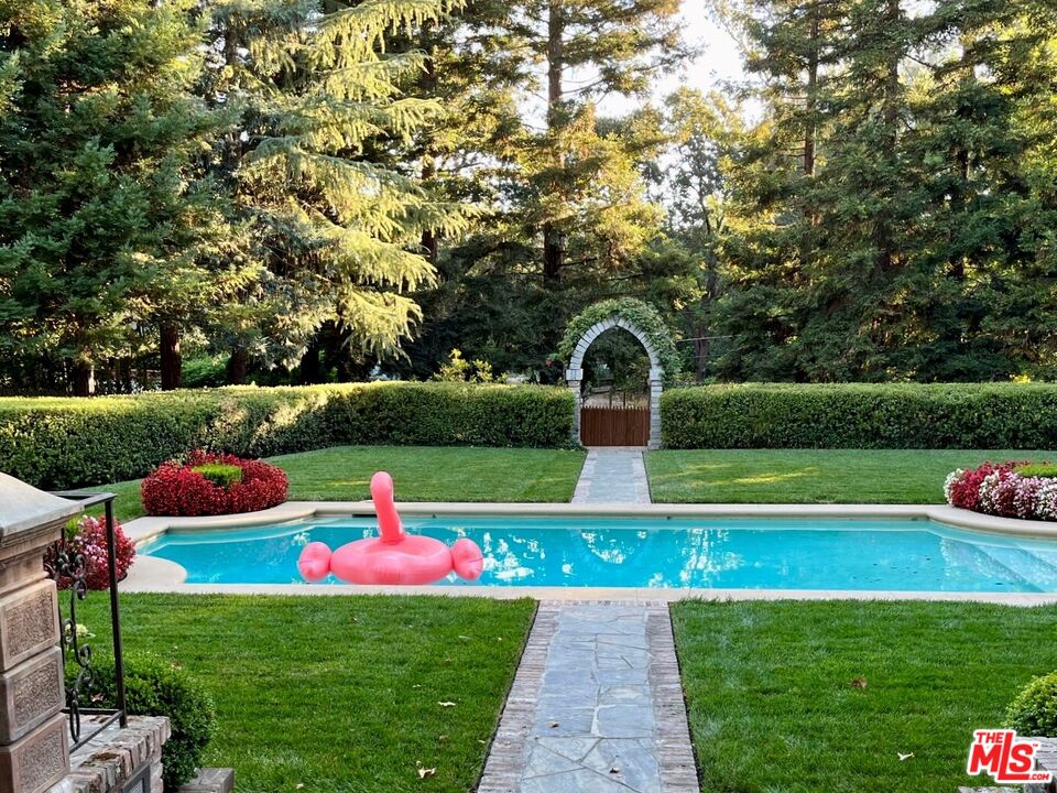 530 Hawthorn Road Sacramento, CA 95864 - Photo 20 of 23 a view of yard with swimming pool and green space