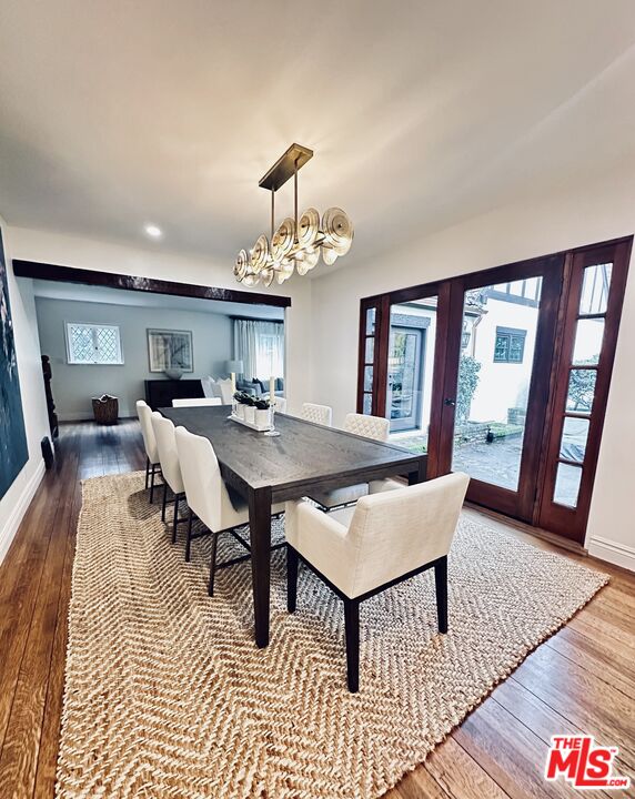 530 Hawthorn Road Sacramento, CA 95864 - Photo 5 of 23 a living room with furniture a rug and a chandelier