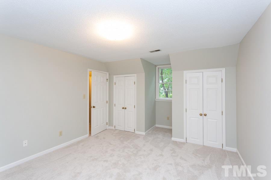6917 Sandringham Drive Raleigh, NC 27613 - Photo 12 of 25 New Carpet and Paint this huge bedroom will hold all your furniture!