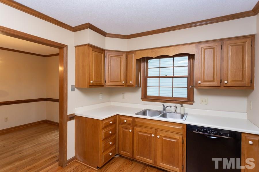 6917 Sandringham Drive Raleigh, NC 27613 - Photo 7 of 25 How nice to be doing dishes while looking out your window!