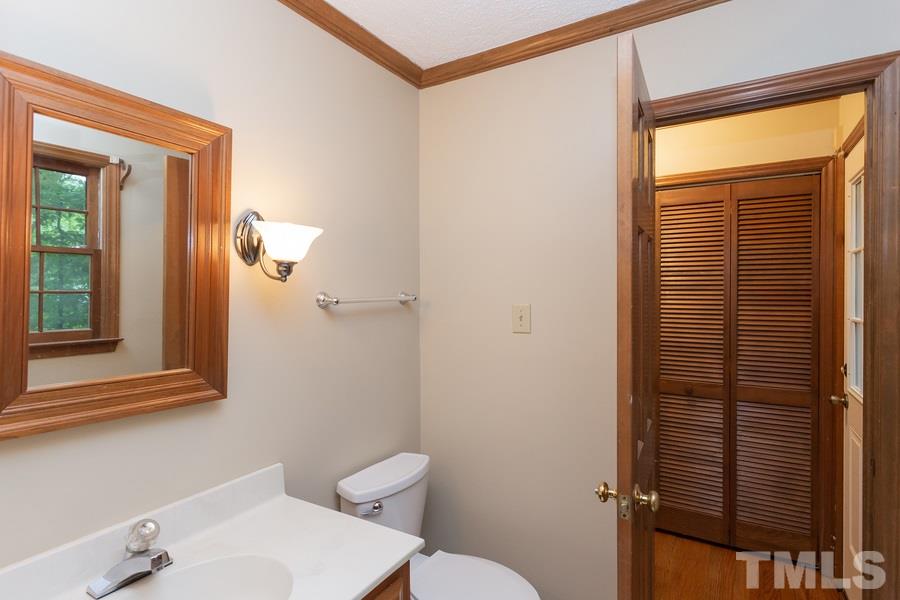6917 Sandringham Drive Raleigh, NC 27613 - Photo 9 of 25 Conveniently located downstairs 1/2 bath!