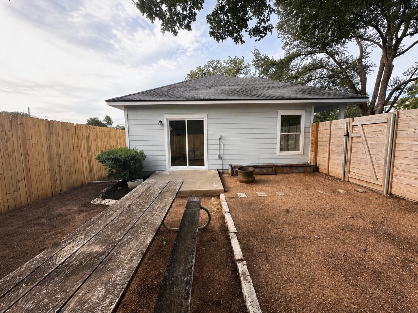 1122 Mansell Avenue Austin, TX 78721 - Photo 26 of 29 a view of a house with a backyard