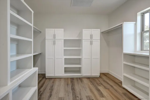 a view of an empty walk in closet