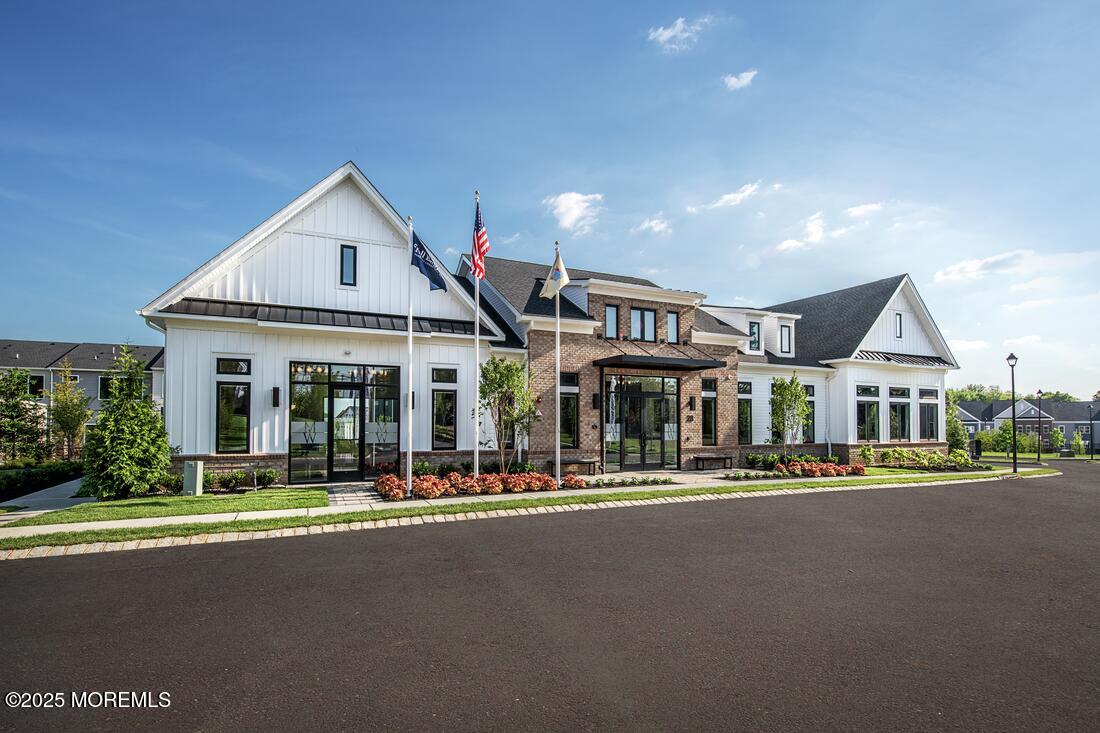 10 Waller Drive Middletown, NJ 07748 - Photo 16 of 25 a front view of a house with a yard
