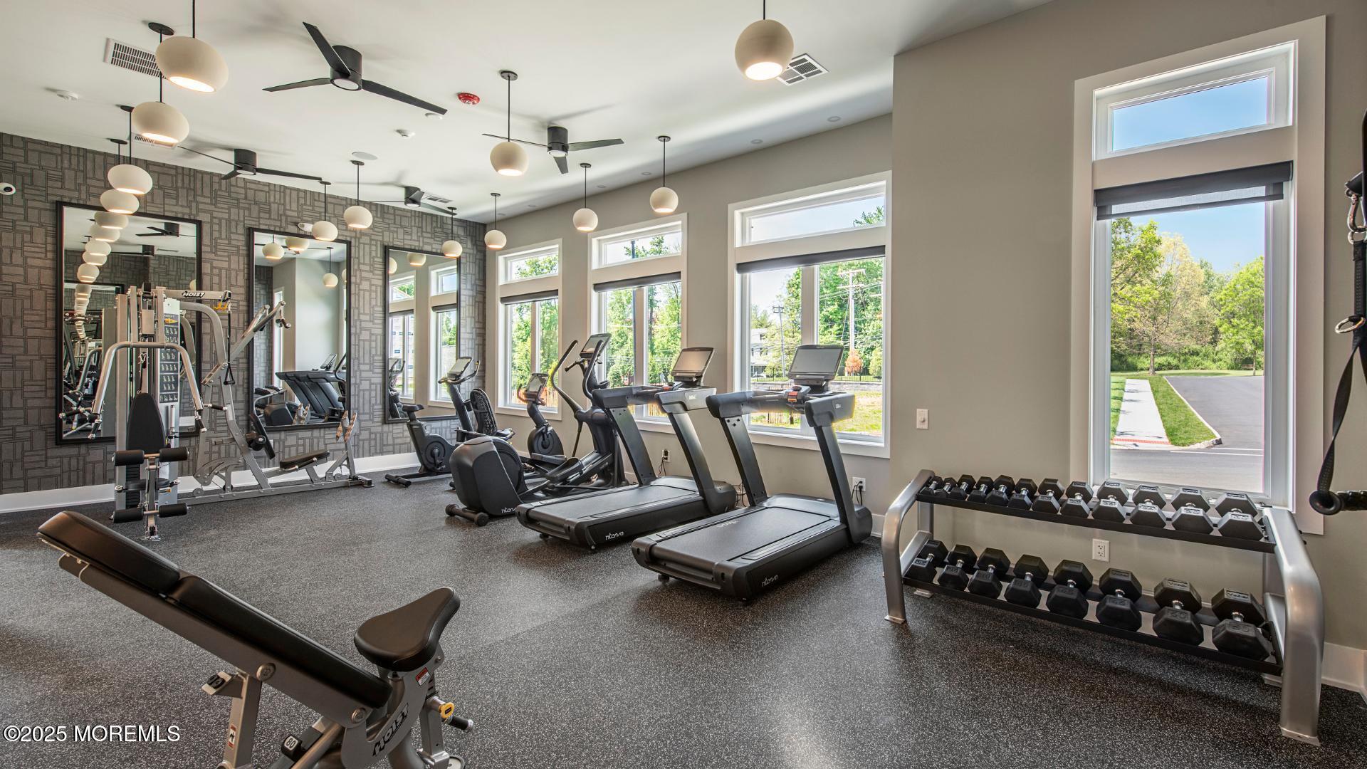 10 Waller Drive Middletown, NJ 07748 - Photo 24 of 25 a view of a room with gym equipment