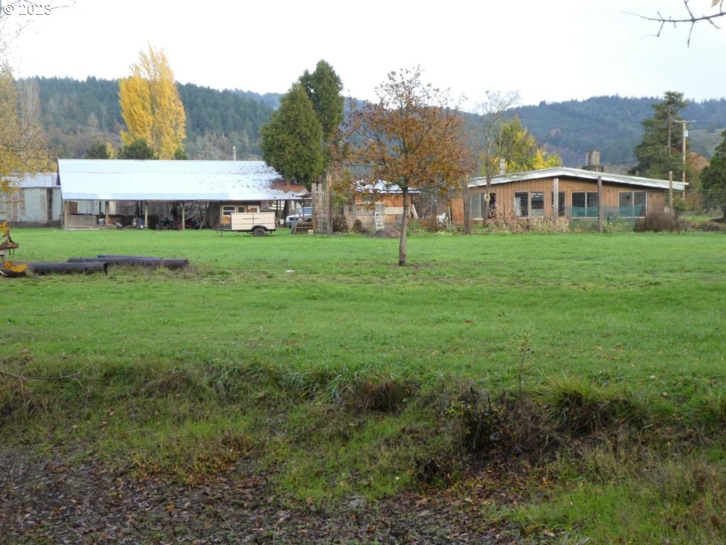 350 Deady Crossing Road Sutherlin, OR 97479 - Photo 12 of 47 a view of a house with a big yard