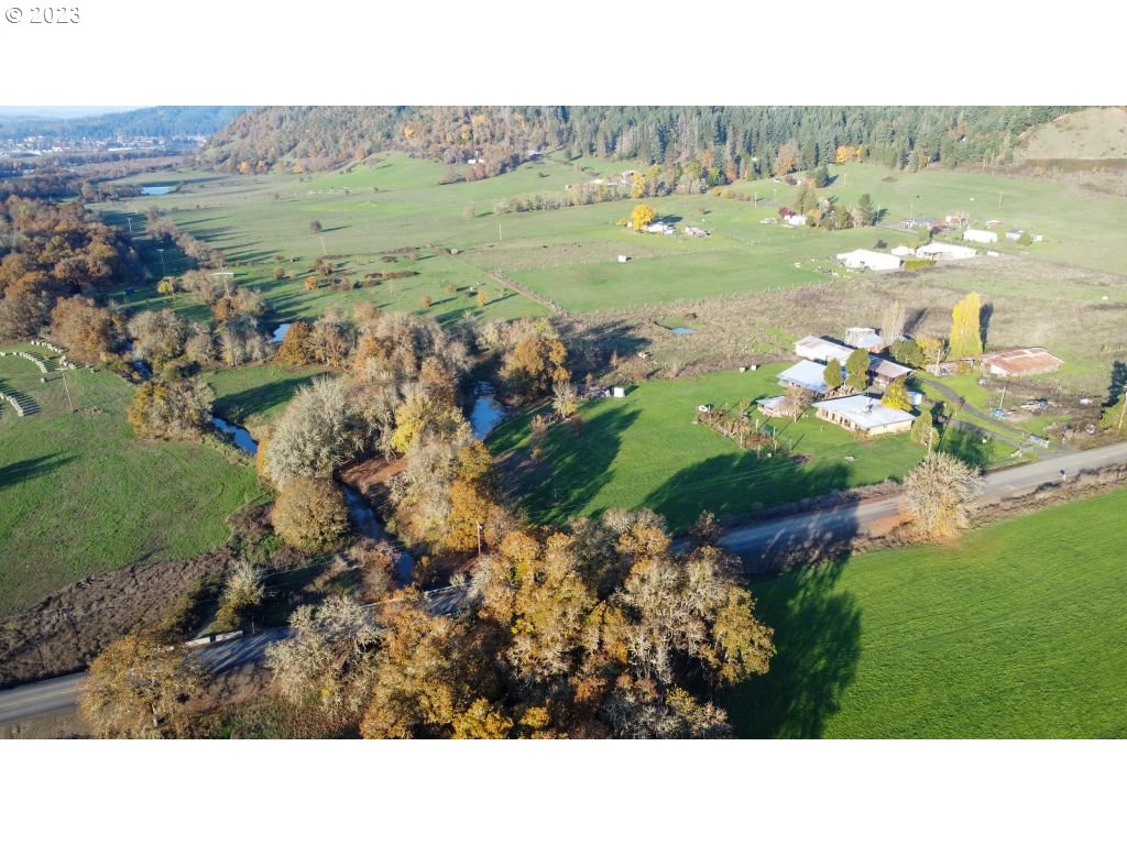 350 Deady Crossing Road Sutherlin, OR 97479 - Photo 33 of 47 a view of a field with a tree