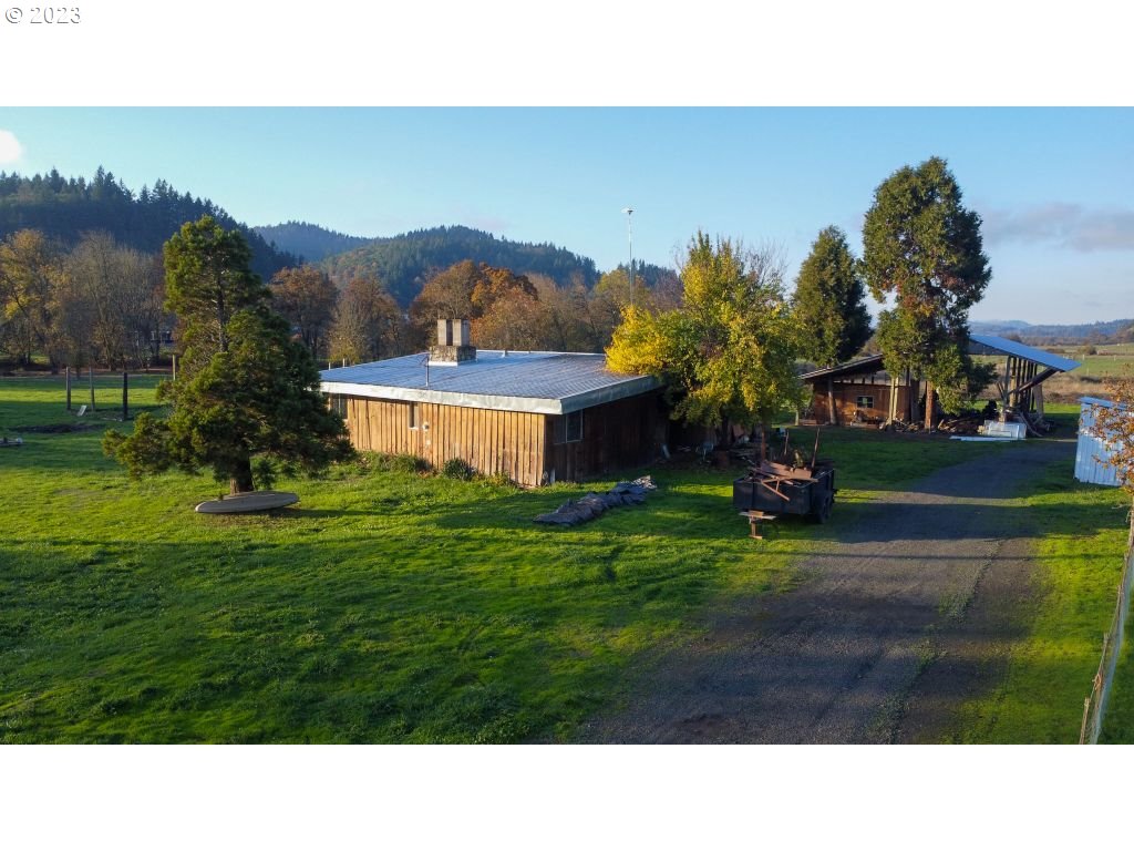 350 Deady Crossing Road Sutherlin, OR 97479 - Photo 40 of 47 a black and white photo of a house