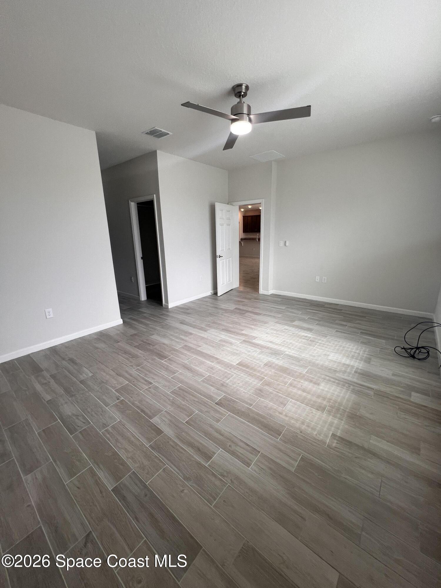 3517 Rixford Way Palm Bay, FL 32909 - Photo 8 of 11 20260805_142327991_iOS