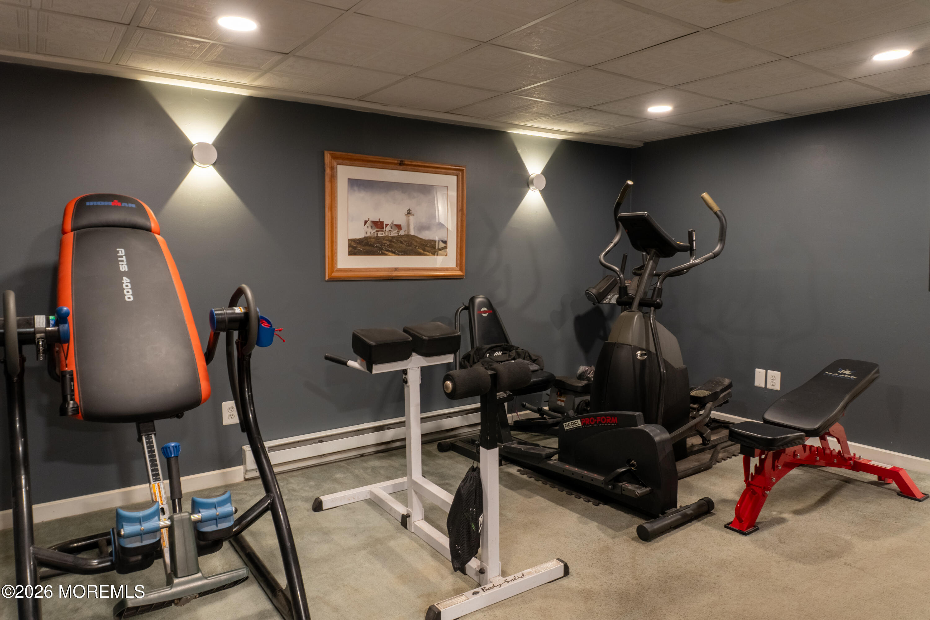 55 Toms River Road Jackson, NJ 08527 - Photo 19 of 31 a room with gym equipment and windows