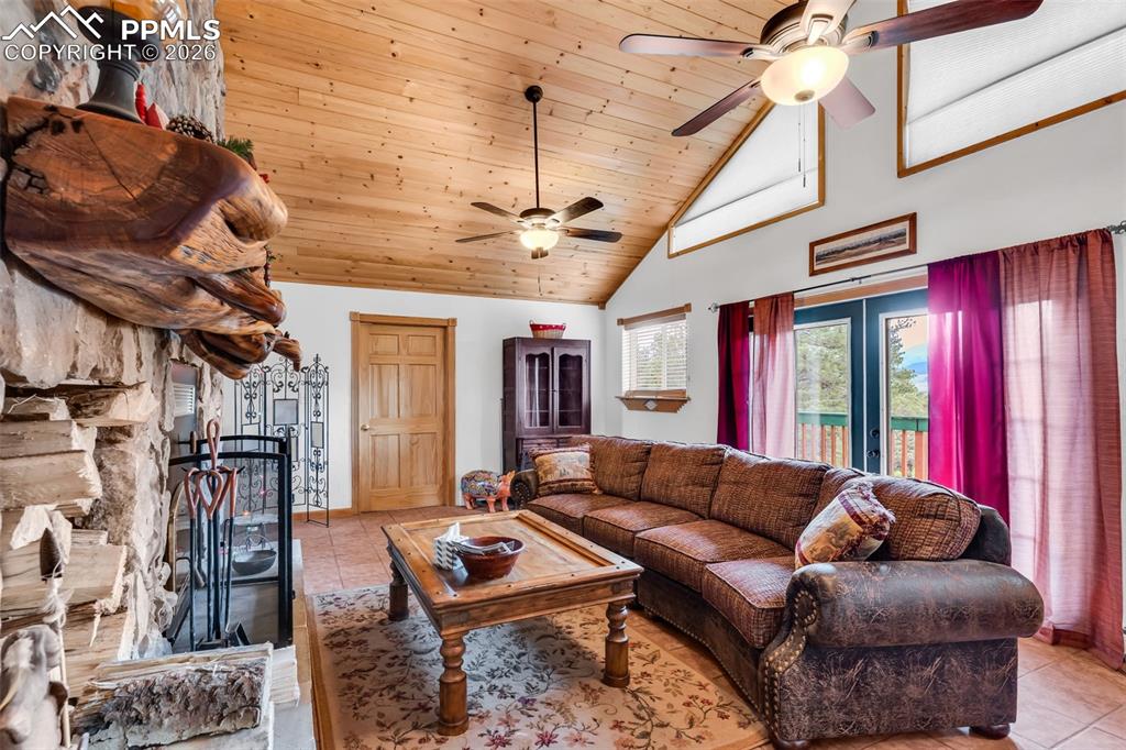 209 Rosewood Road Westcliffe, CO 81252 - Photo 15 of 49 Walkout to back deck from the family room and door to primary bedroom